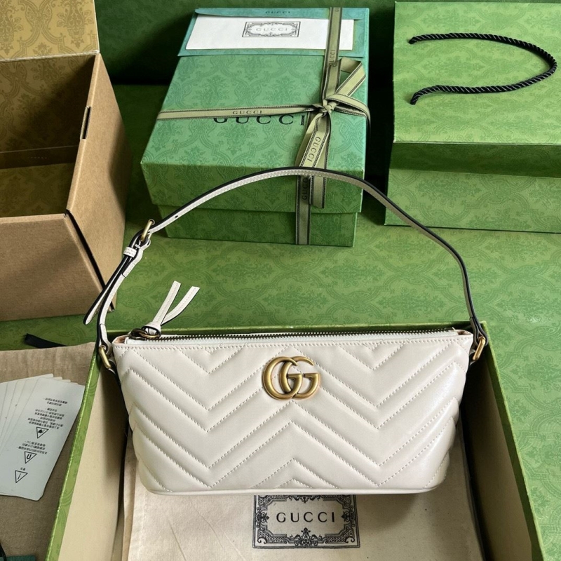 G*u*i top handle bags